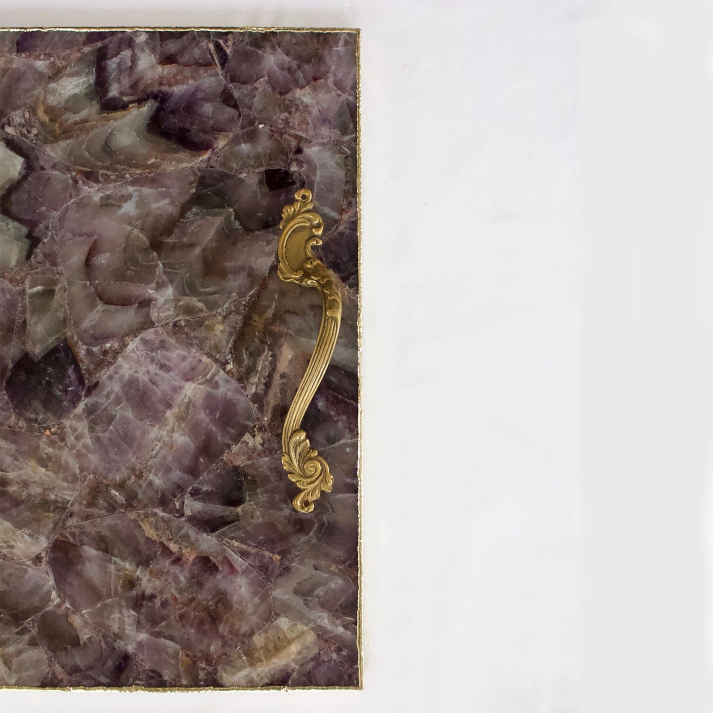 Luxury stone serving platter with purple marbled stone and ornate gold handle from The Tangerine Store