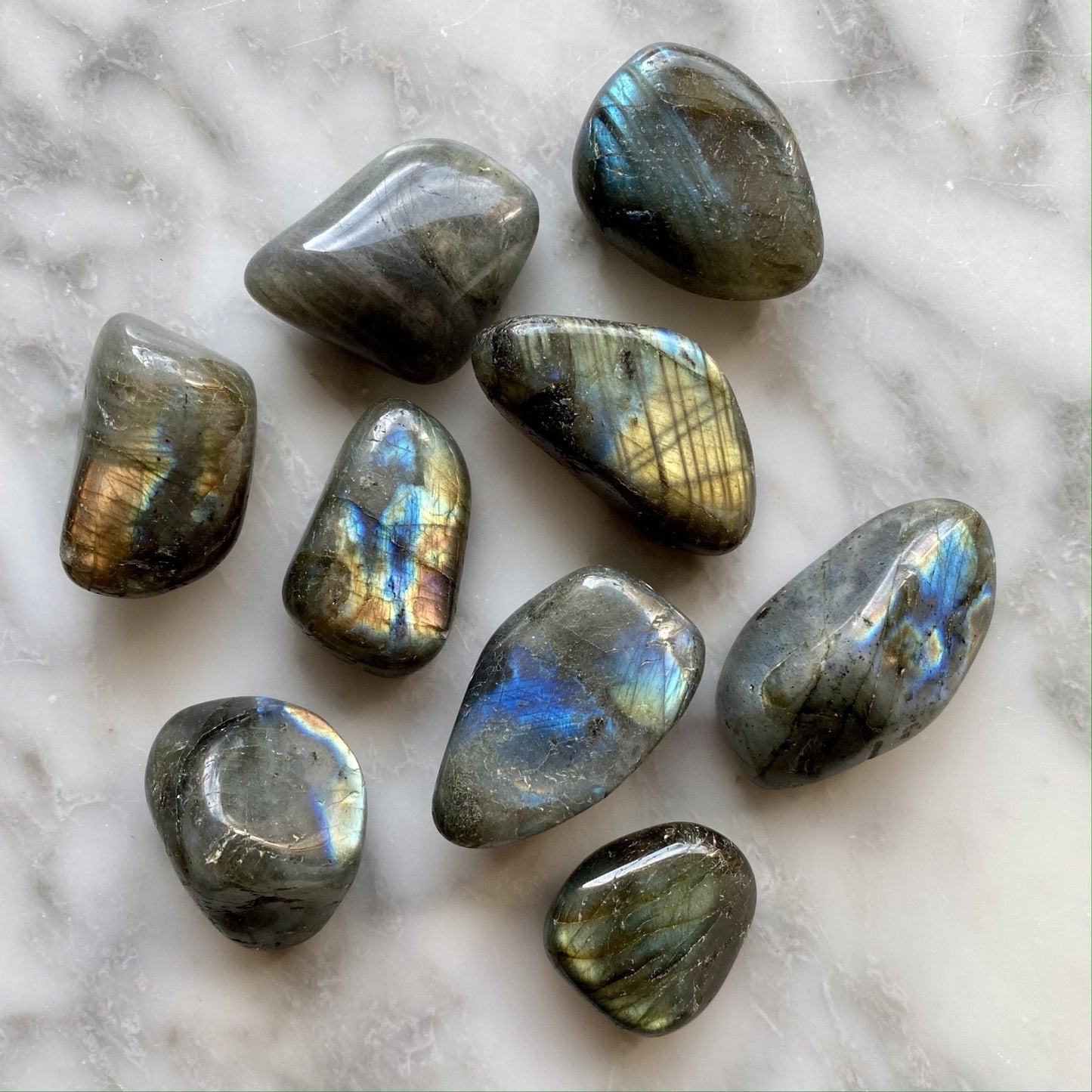 AmazeU tumbled labradorite stones showcasing iridescent blue and gold flashes buy tumbled labradorite stones online