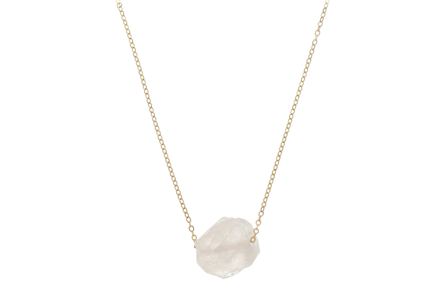 Kuratif handmade crystal necklace with a raw clear crystal pendant on a delicate gold chain