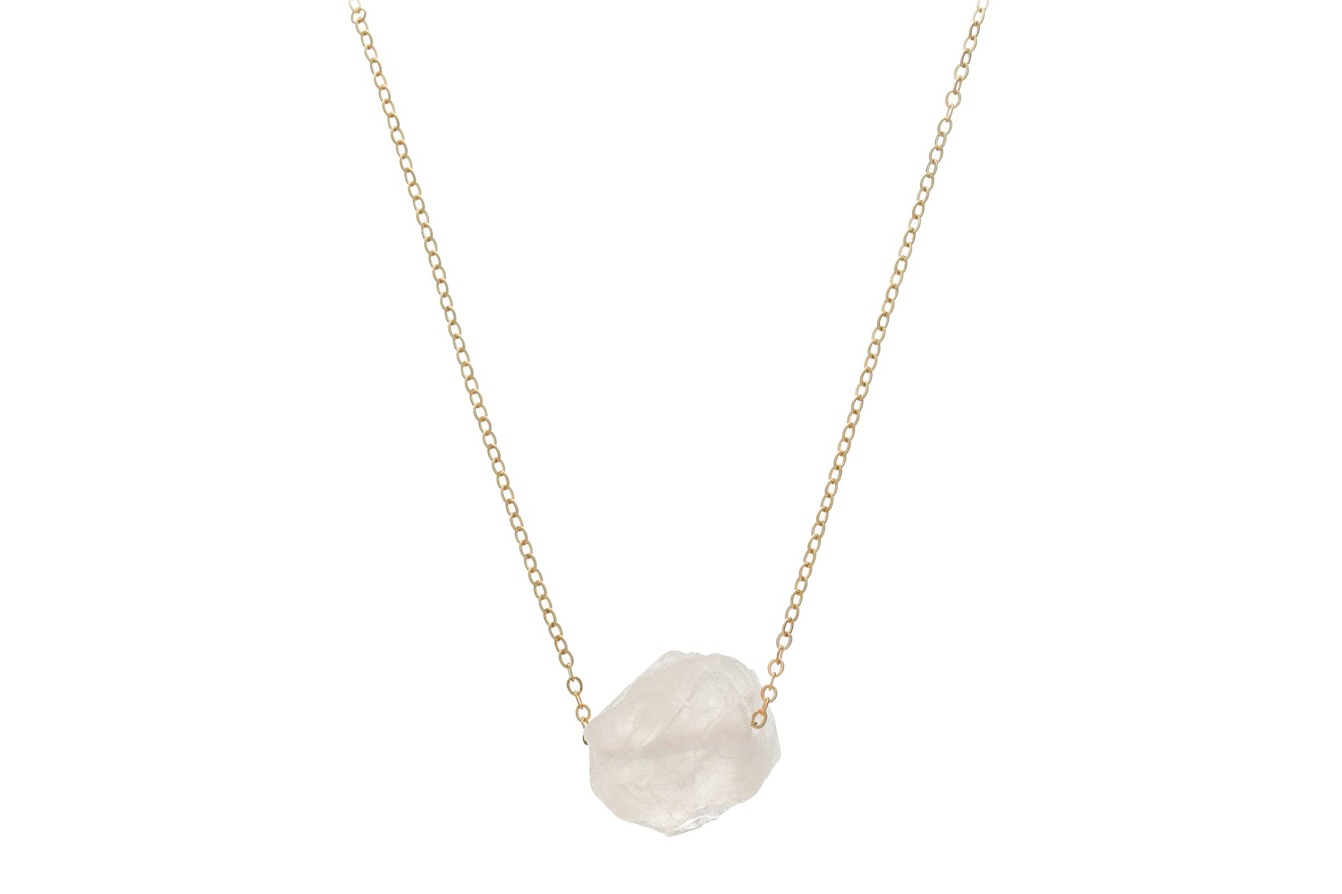 Kuratif handmade crystal necklace with a raw clear crystal pendant on a delicate gold chain
